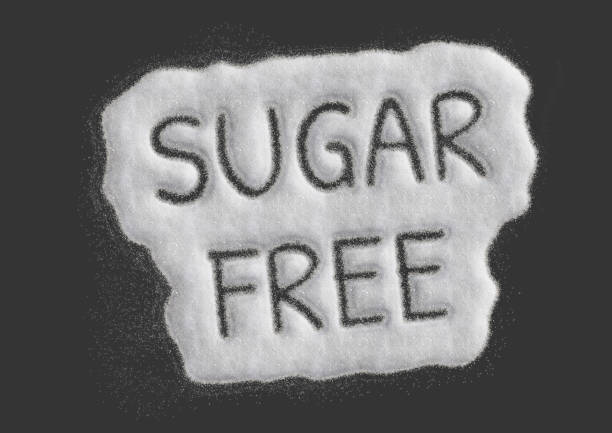istock Sugar Free written on sugar powder. Made in Photoshop with stylized effects - clouds and grains. 1257555782