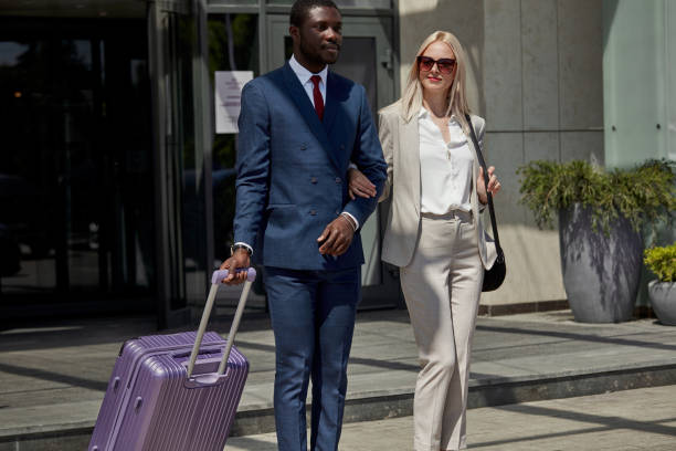 istock personal bellboy accompanies the client, helps with luggage 1257556951