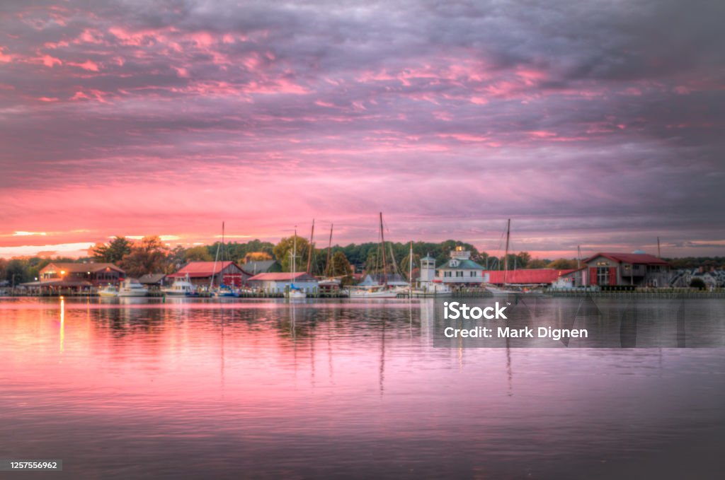 Purple Sunset in St. Michaels, Maryland Very purple sunset at the St. Michaels harbor in Maryland Maryland - US State Stock Photo