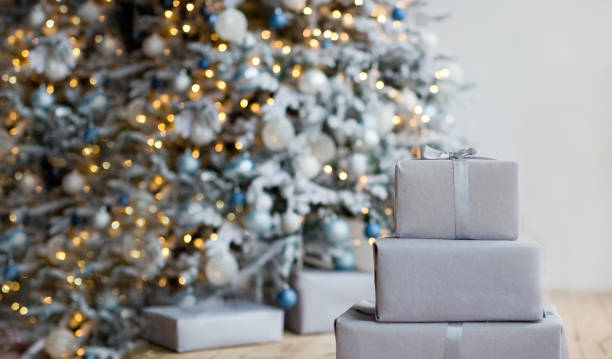 istock Craft Christmas boxes near Christmas tree 1257557309