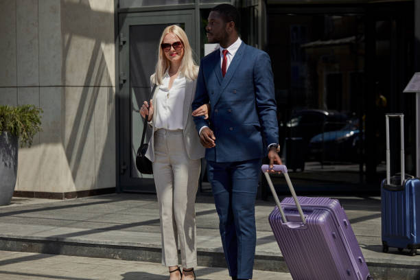 istock affable hotel clerk serve business client 1257557458