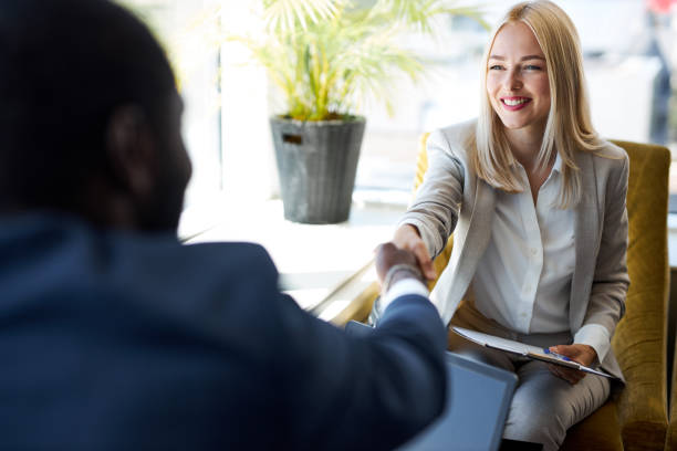 istock business partners shake hands to each other 1257558899