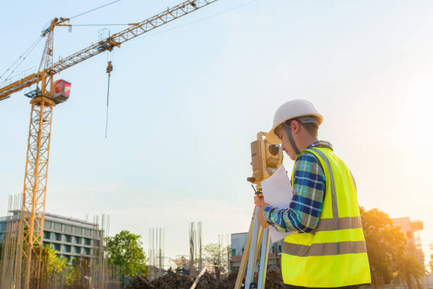 istock Civil engineer inspects work using radio communication with the management team in the construction area. 1257559261