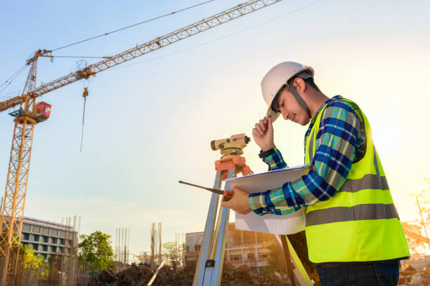 istock Civil engineer inspects work using radio communication with the management team in the construction area. 1257559265