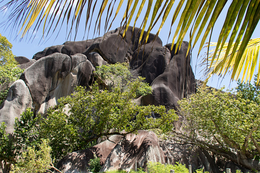 Amazing granite boulders beach L'Union Estate national park, La Digue Island, Seychelles