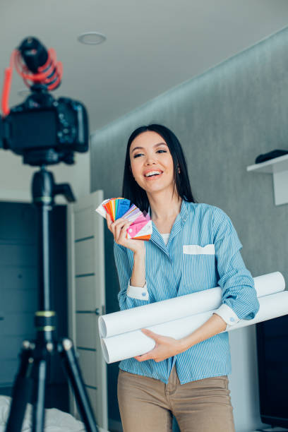 istock Positive interior designer introducing her ideas to the camera 1257562455