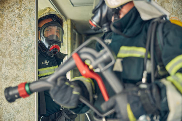 istock Firefighter crew in the indoors learning put out a fire 1257564396