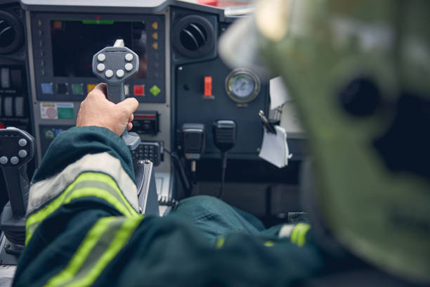 istock Man putting arm on the dashboard of truck while managing it 1257564988