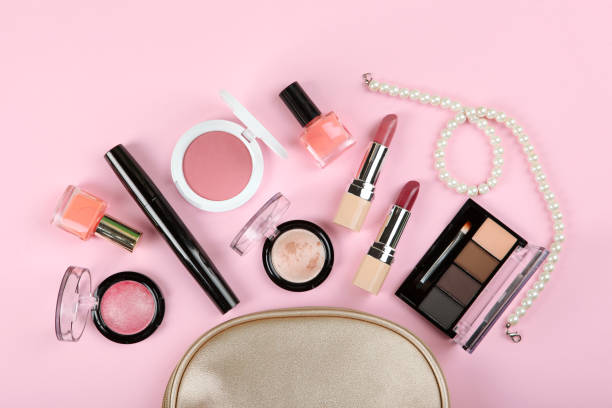 istock professional makeup tools. Makeup products on plain background top view. A set of various items for makeup. 1257565133