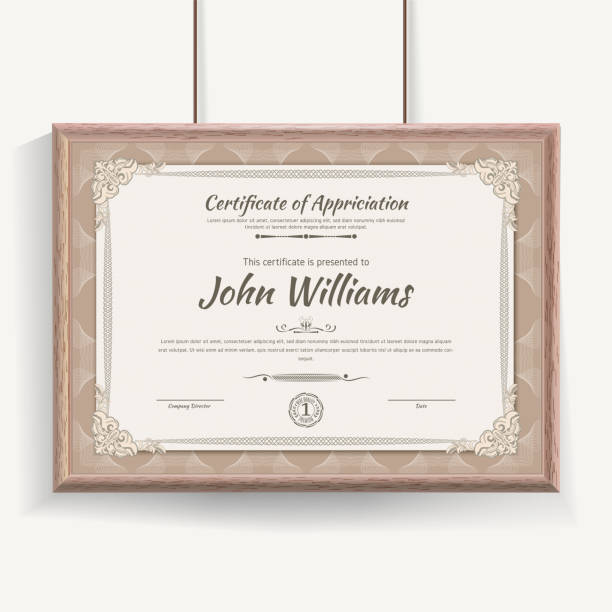 istock Official beige guilloche border for certificate. Vector illustration. Certificate in beige wooden frame hanging on wall 1257568144