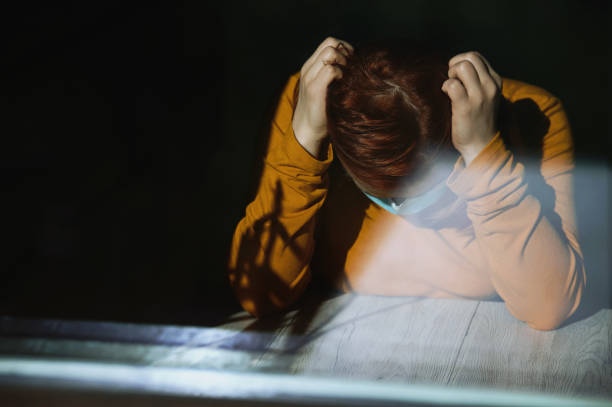 istock Having headache and a very bad time during coronavirus 1257568196