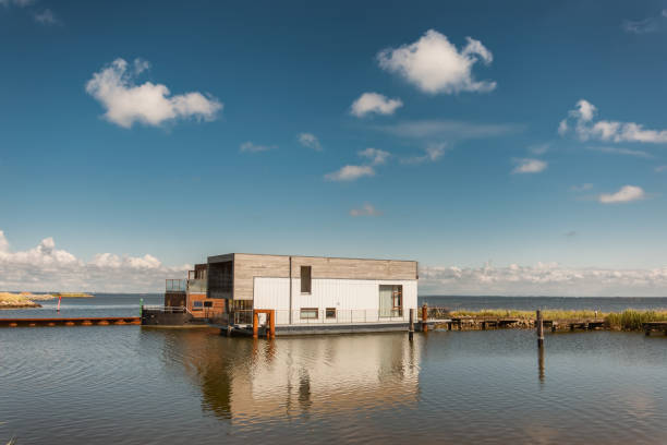 House boats in Hvide Sande at the North Sea coast in Denmark - fotografia de stock