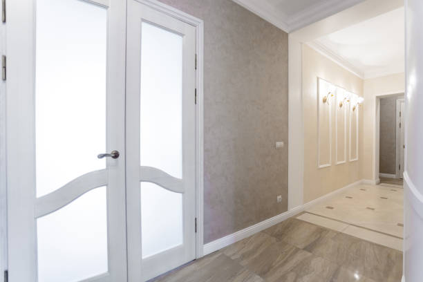 istock bright corridor with a large door 1257571700