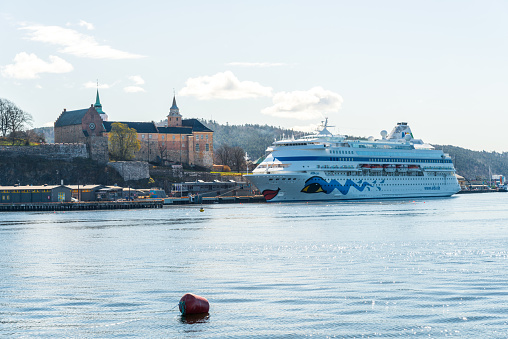 Turku, Finland – June 09, 2023: A luxurious cruise ship moored in a dock, its massive size creating an impressive scene
