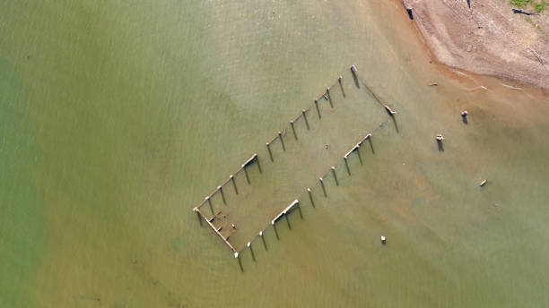 Aerial top view of Old temples Aerial top view of Old temples in the water at Sangklaburi in Kanchanaburi province, Thailand sangkhla stock pictures, royalty-free photos & images