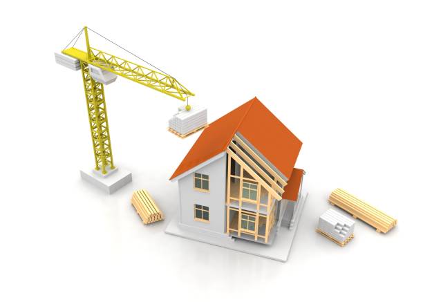 istock House 3d rendering illustration with open interior on top. Blueprints, documents, crane and mortgage calculations. 1257575602