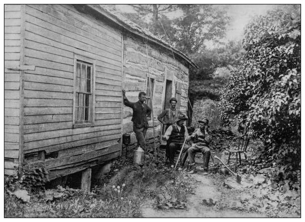 Antique black and white photo: Old log cabin, Fish lake, Indiana