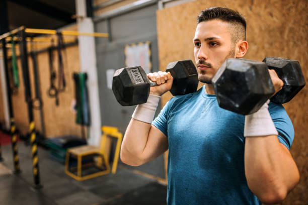 istock Warm up Weightlifting In Gym 1257576792
