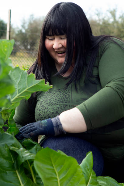 istock woman in the orchard 1257578886