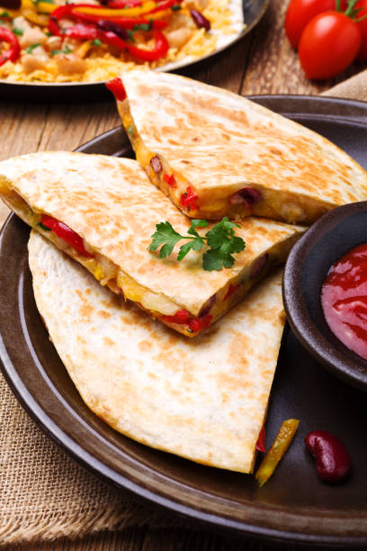istock Quesadilla with chicken, served with guacamole or salsa sauce. 1257578911
