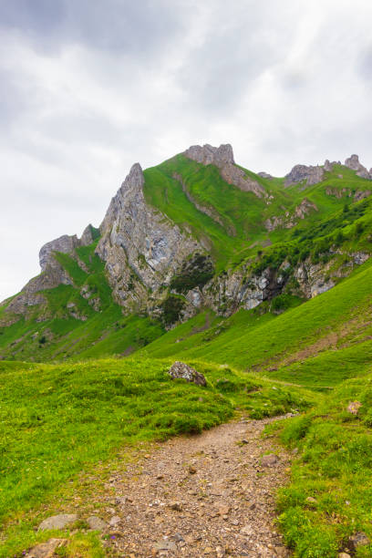 Mountain peak again white clouds. Mountain peak again white clouds. Meglisalp, Appenzell Canton, Switzerland. appenzell innerrhoden stock pictures, royalty-free photos & images
