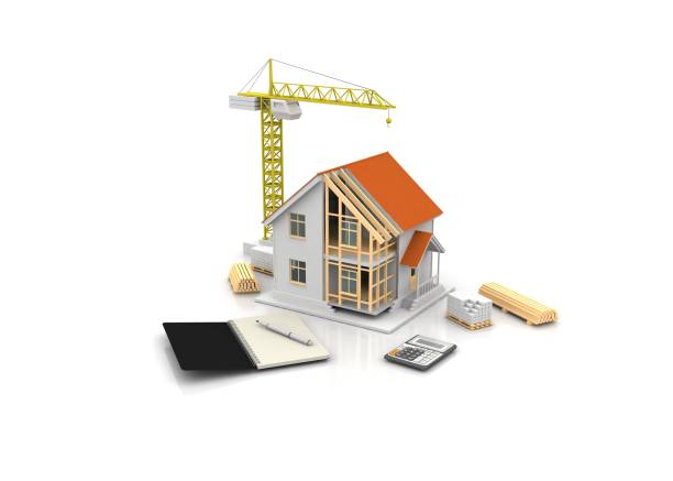 istock House 3d rendering illustration with open interior on top. Blueprints, documents, crane and mortgage calculations. 1257580548
