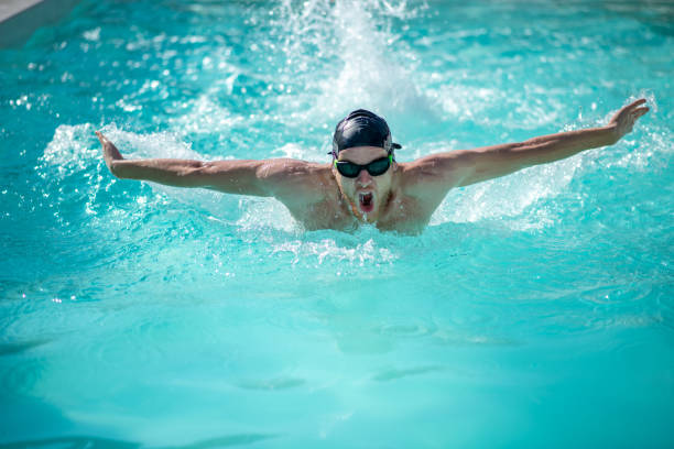 istock Swimmer on chest, hands to sides, mouth is open 1257582013