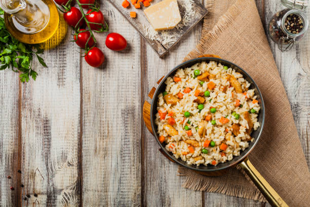 istock Delicious risotto with chicken and green peas. 1257582964