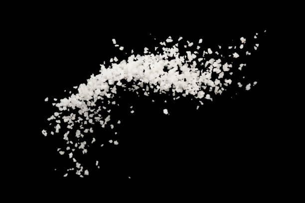 istock Salt splash explosion  isolated on black background , freeze stop motion 1257585068