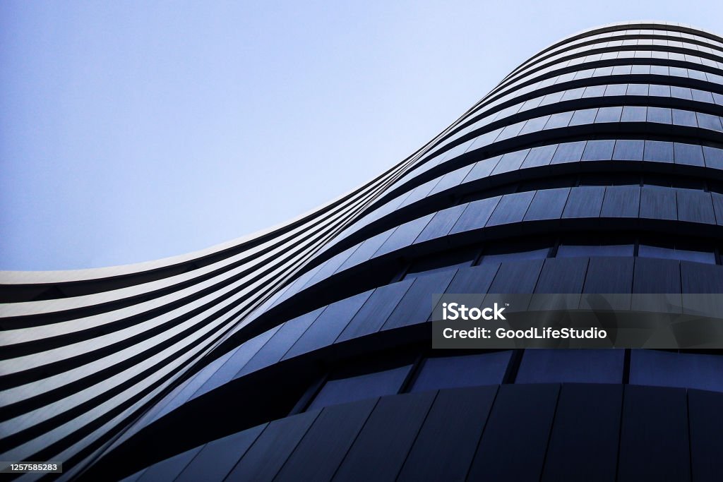 Futuristic architecture Modern office building. Building Exterior Stock Photo