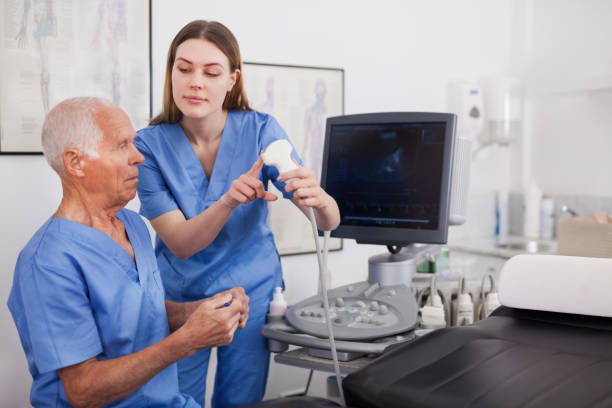 istock Skilled sonographer showing new equipment to assistant 1257589784