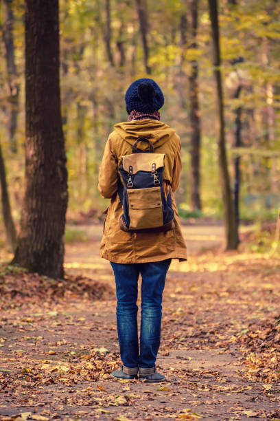 istock Hipster girl in a park 1257592965