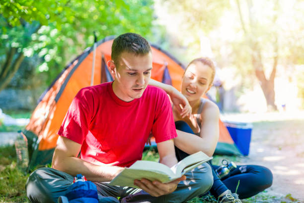 istock Young couple at the campsite 1257596724