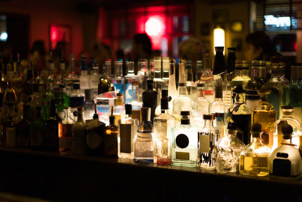 drink bottles in a bar - hard liqueur imagens e fotografias de stock