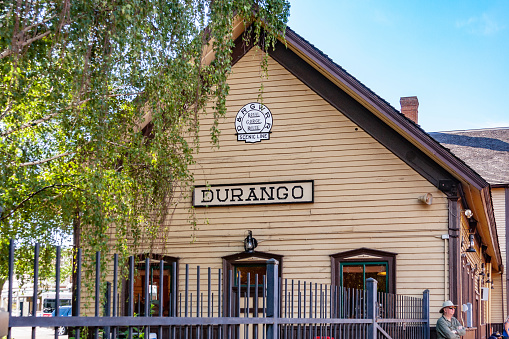Durango, CO / USA – August 13, 2012: Wooden depot building  for the Durango and Silverton Narrow Gauge Railroad located in Durango, Colorado.