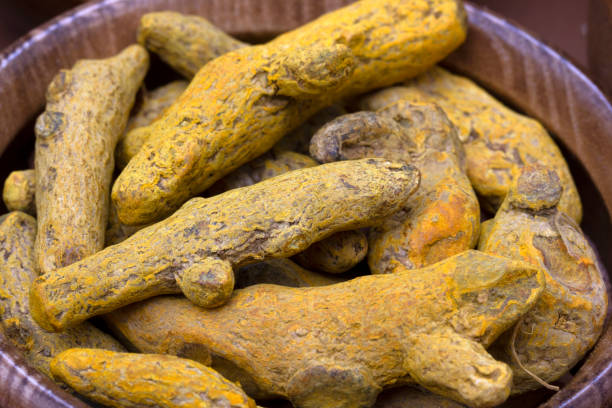 istock Asian Ingredients. Tumeric rhizomes close-up. 1257602484