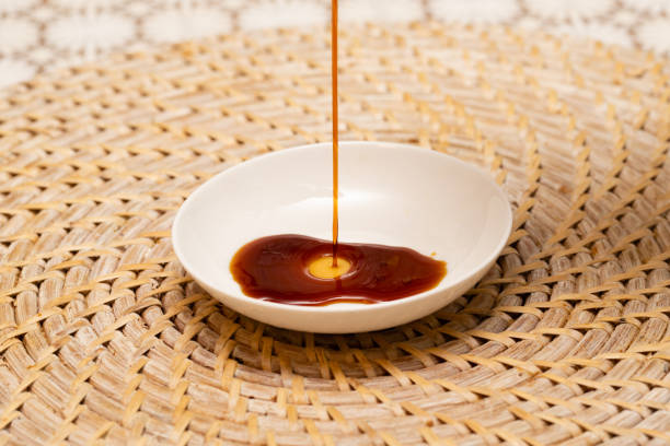 istock Soy sauce poured on a small white plate 1257602831
