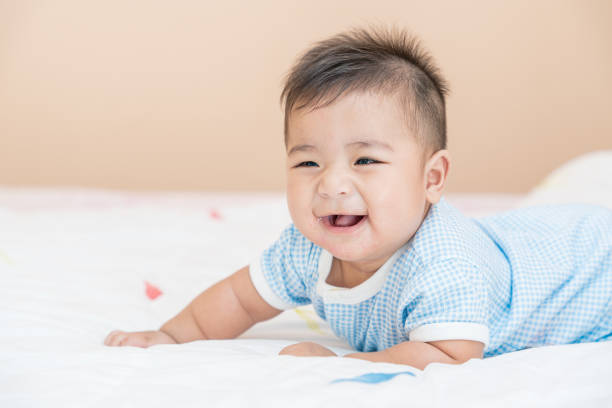 istock A cute baby boy smiling. 1257604306