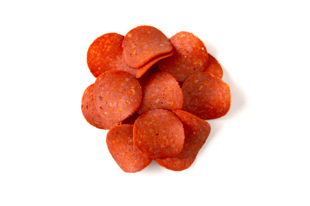 pile of turkey pepperoni on isolated on white background with clipping path - fat portion studio shot close up imagens e fotografias de stock