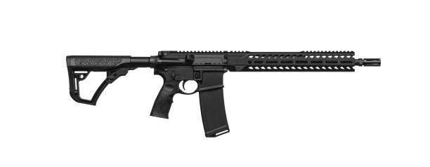 istock Modern automatic rifle isolated on white background. Weapons for police, special forces and the army.  Assault rifle on white back. 1257610519