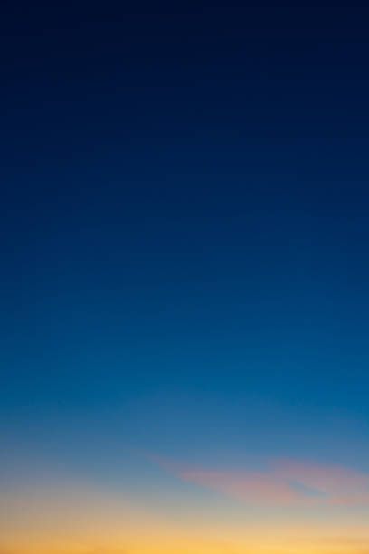 istock Colorful clear sky with no clouds at dusk after sunset 1257611166
