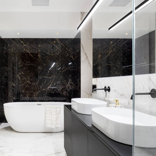 элегантная ванная комната с черной мраморной стеной - frame ellipse photograph black стоковые фото и изображения