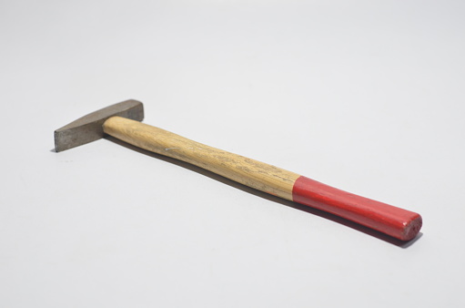 Photo of a hammer on a blank white background