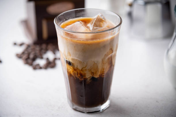 istock iced coffee with milk and dripping tools 1257619003
