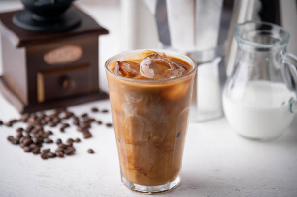 istock iced coffee with milk and dripping tools 1257619047