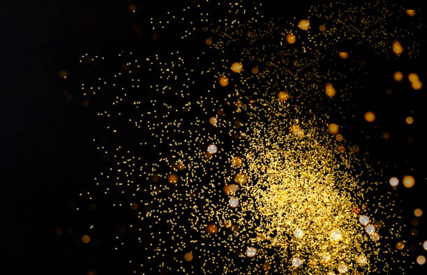 istock Abstract dark background with golden sparkles. Blurred  effect. Concept for festive background or for project. 1257624254
