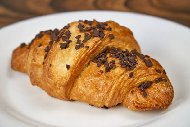istock Croissant with chocolate sprinkles 1257624408