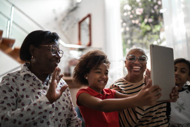 istock Three woman's generation family doing a video call 1257628416