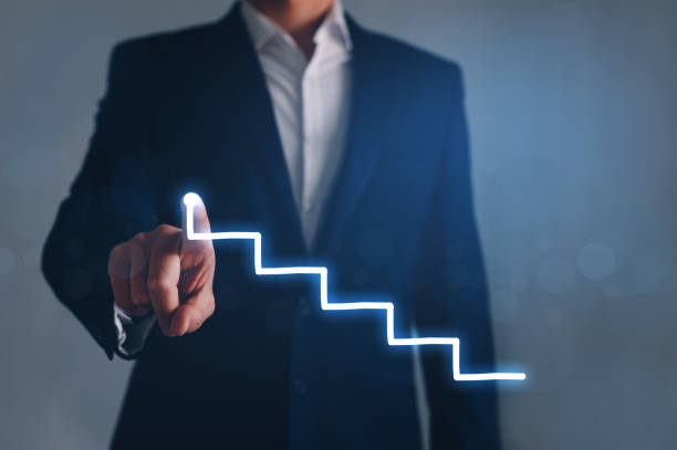 istock Businessman pointing arrow graph growing corporate. Development  to success concept. 1257629472