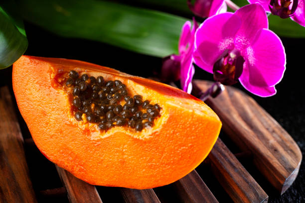 istock Papaya, fresh tropical fruit with seeds 1257631387